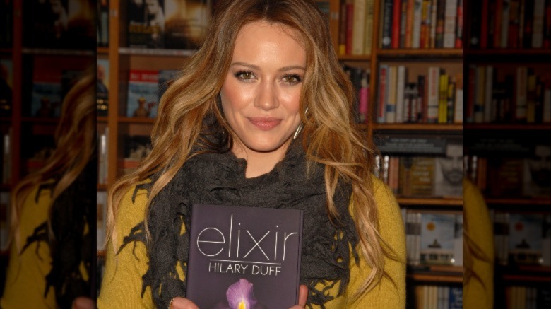 Hilary Duff with her novel Elixir