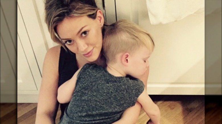 Hilary Duff holding her son Luca