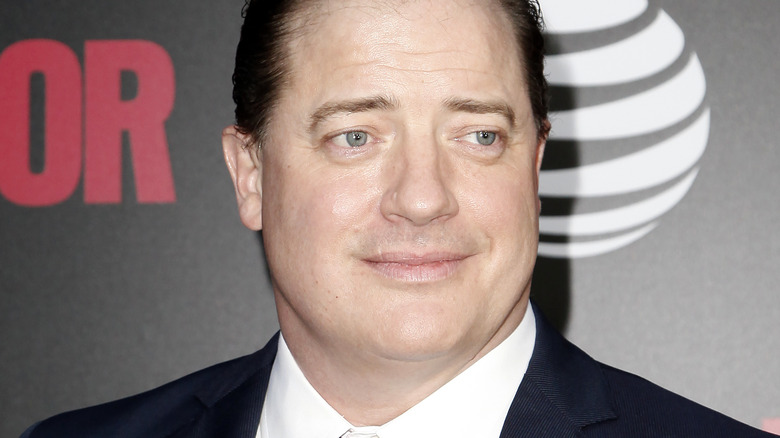 Brendan Fraser looking to the side on the red carpet