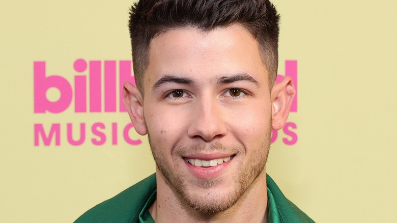 Nick Jonas smiling