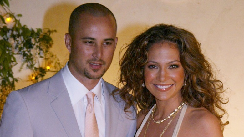 Jennifer Lopez and Cris Judd all smiles posing for cameras