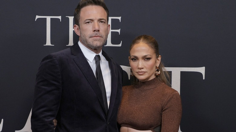 Jennifer Lopez and Ben Affleck pose on red carpet