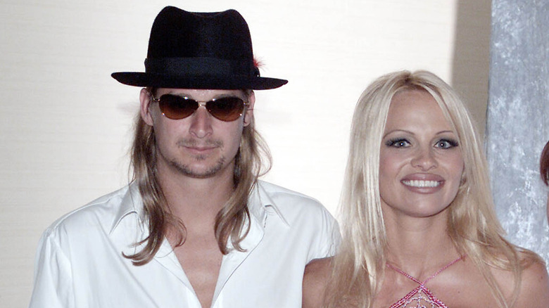 Kid Rock and Pamela Anderson posing