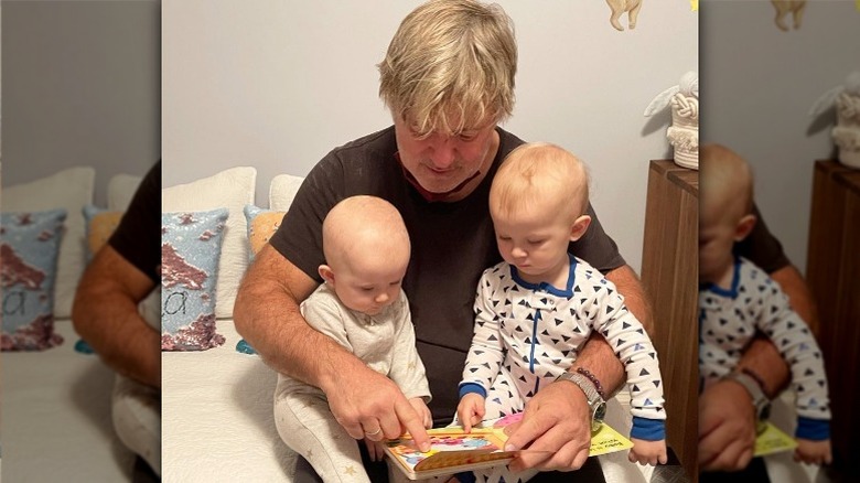 Alec Baldwin reading a bedtime story to his children