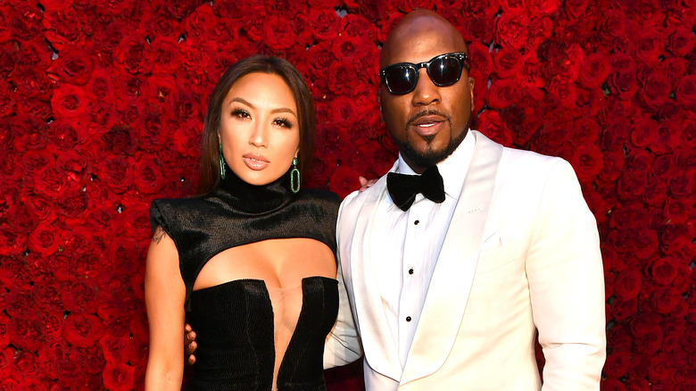 Jeannie Mai and Jeezy pose with roses