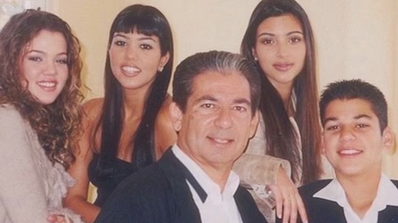 The Kardashian family smiling 