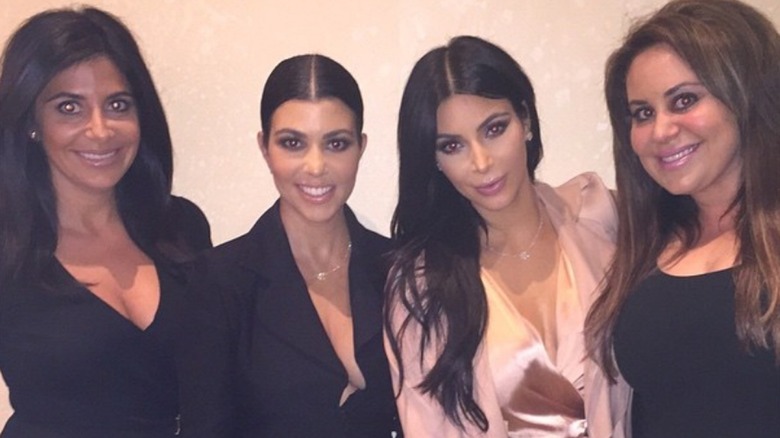 Kim Kardashian and her cousins smiling 