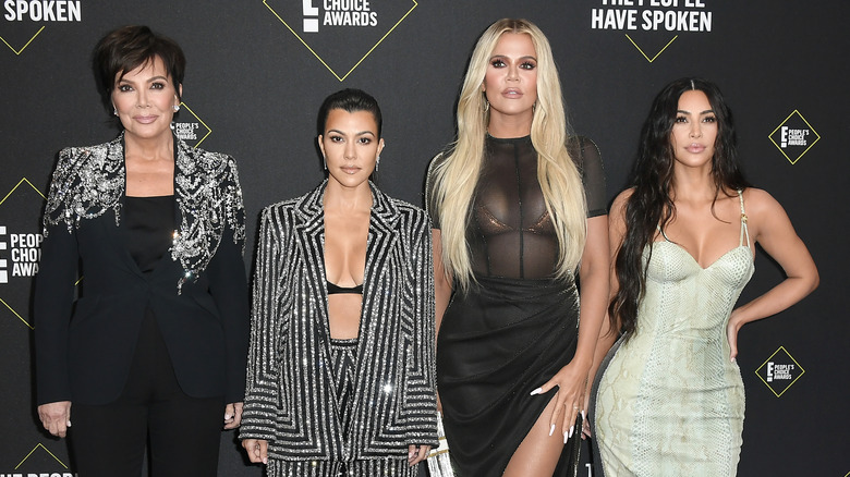 The Kardashians posing at event