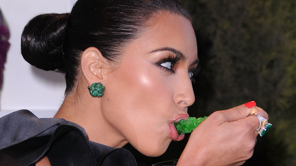 Kim Kardashian eating rock candy