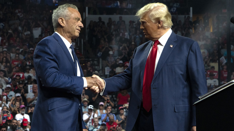 Robert F. Kennedy Jr. and Donald Trump shaking hands