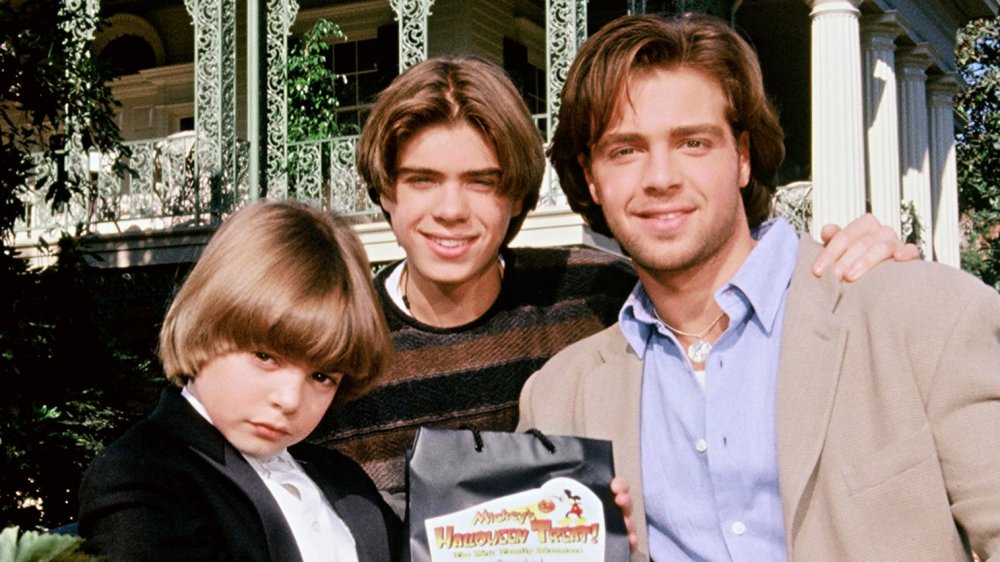 Andrew Lawrence, Matthew Lawrence, and Joey Lawrence pose at Disneyland in 1995