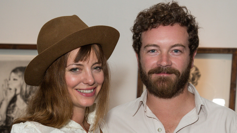 Bijou Phillips smiling with Danny Masterson