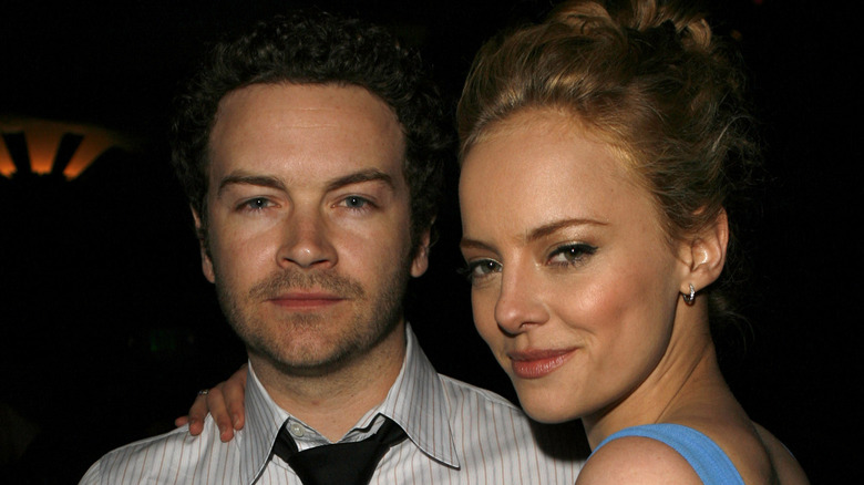 Bijou Phillips with arm around Danny Masterson