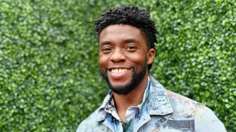 Chadwick Boseman, grinning