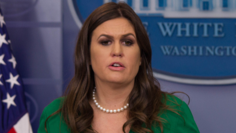 Sarah Huckabee Sanders speaking at a press briefing