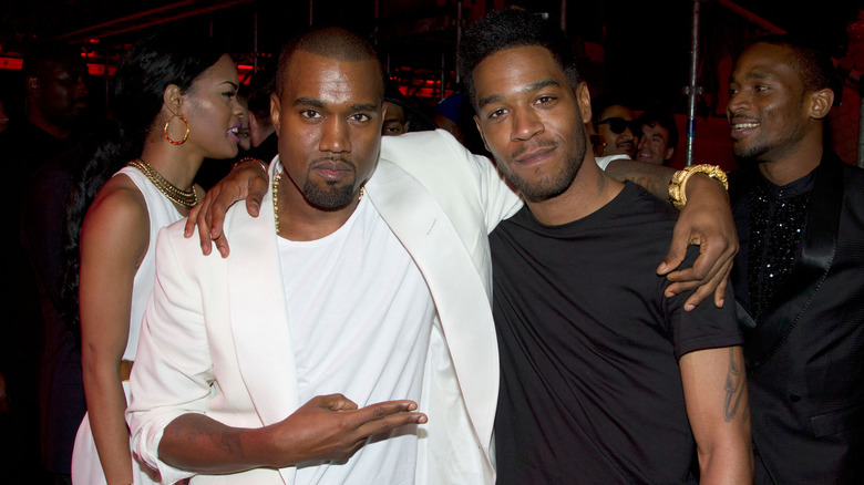 Kanye West and Kid Cudi smiling