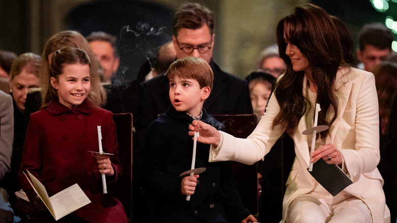 Kate Middleton and kids holding candles