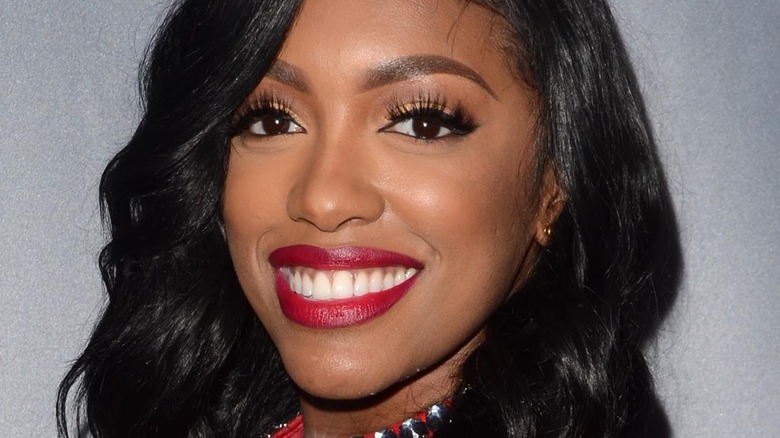 Porsha Williams smiles on the red carpet