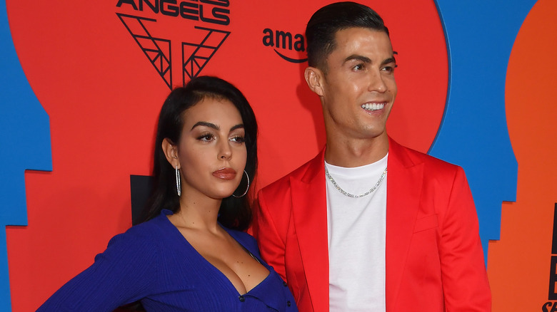 Cristiano Ronaldo and Georgina Rodriguez pose at an event together