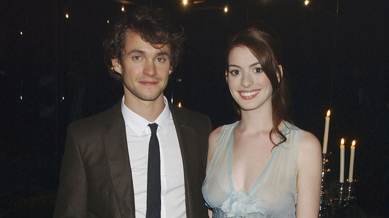 Hugh Dancy and Anne Hathaway posing