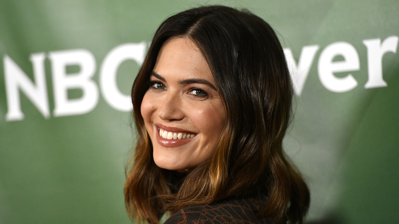 Mandy Moore smiling on red carpet