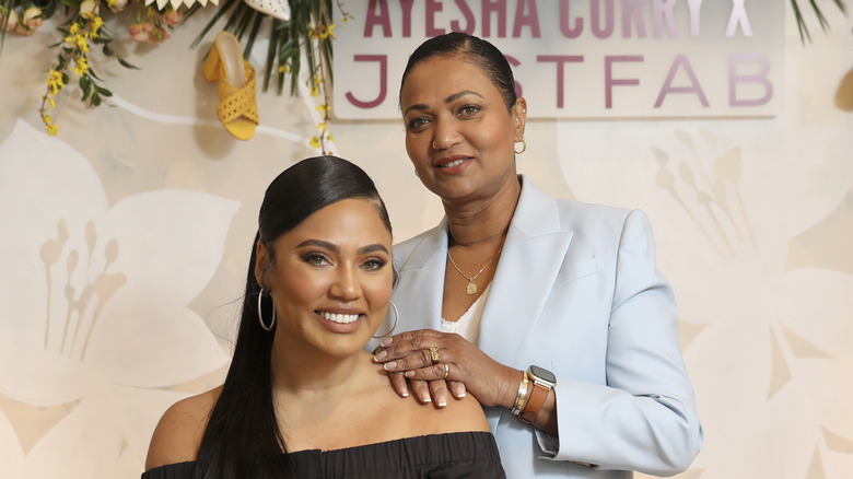 Ayesha Curry and her mother, Carol Alexander, posing together