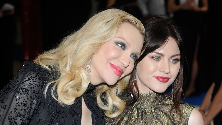 Courtney Love and daughter Frances Bean Cobain smiling together