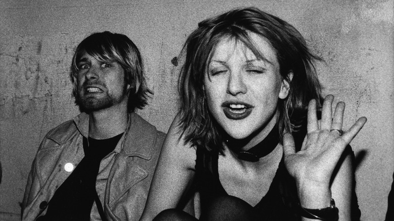 Kurt Cobain and Courtney Love reacting to the camera