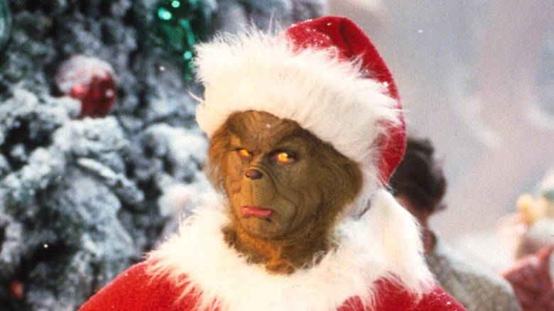 Jim Carrey as The Grinch scowling