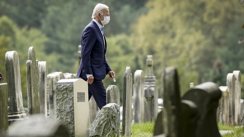 Joe Biden walking cemetery