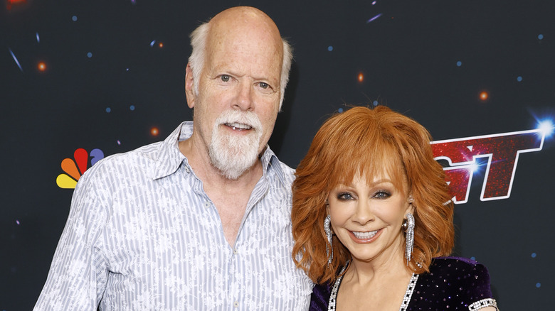 Rex Linn and Reba McEntire smiling