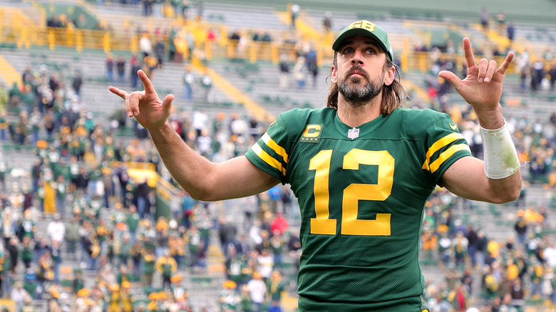 Aaron Rodgers posing in field