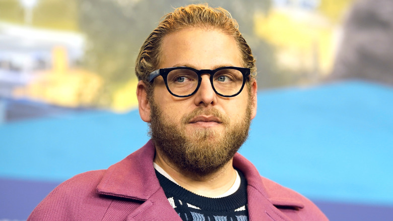 Jonah Hill wearing a pink coat at a Berlin film festival in 2019