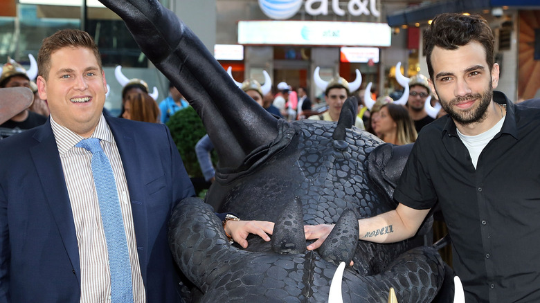 Jay Baruchel looking unamused as he lies next to Jonah Hill in This Is The End