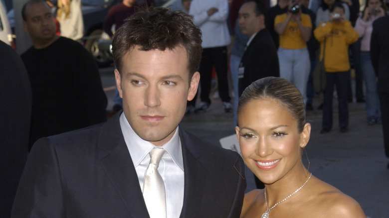 Ben Affleck posing with Jennifer Lopez