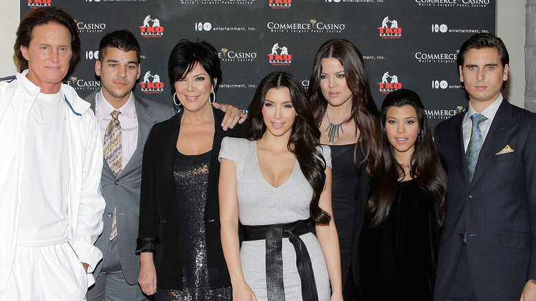 Scott Disick posing with Kardashian family