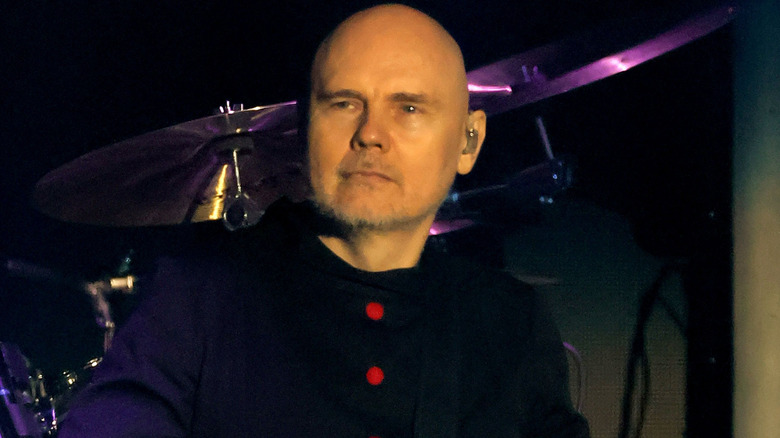 Billy Corgan performing on stage in December 2024 in Inglewood, California