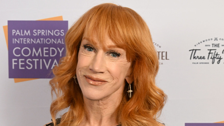 Kathy Griffin posing for the cameras at an awards ceremony in 2024