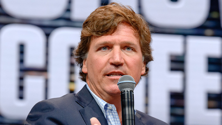 Tucker Carlson speaking at a conference in Hollywood, Florida in April 2024