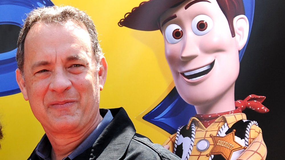 Tom Hanks posing with Woody