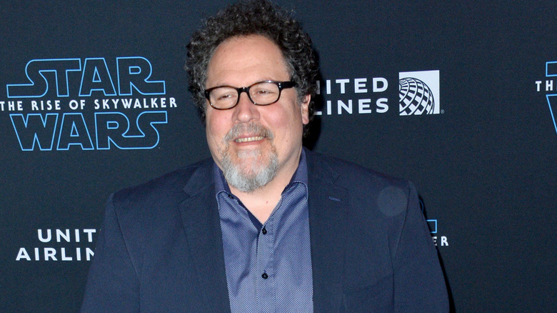 Jon Favreau smiling at movie premiere