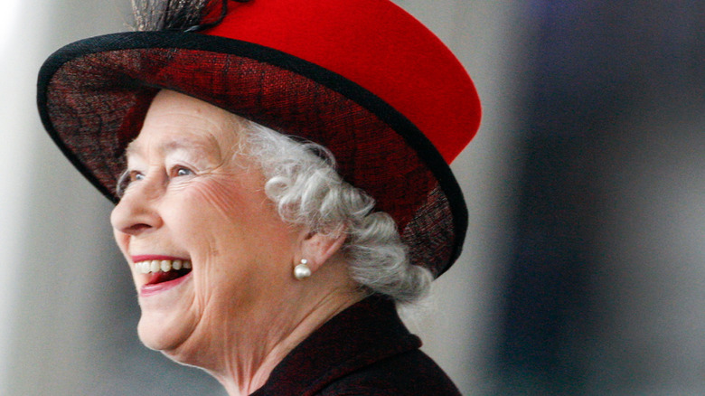 Queen Elizabeth II laughing