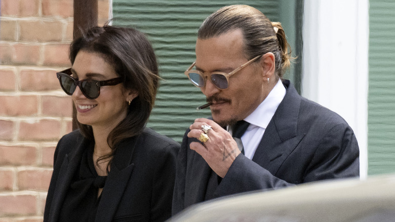 Joelle Rich and Johnny Depp outside the courthouse