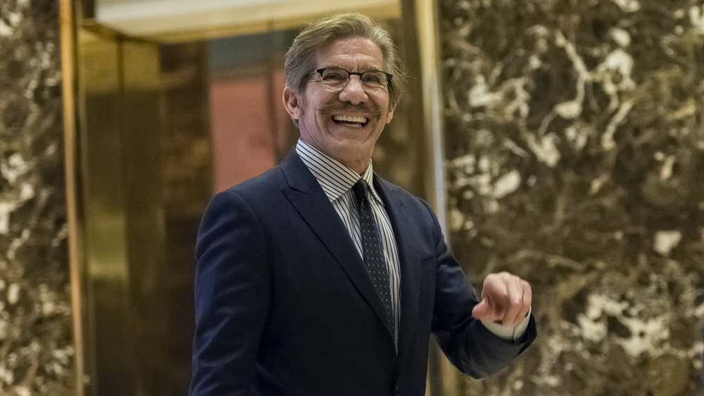 Geraldo Rivera walking in Trump Tower lobby