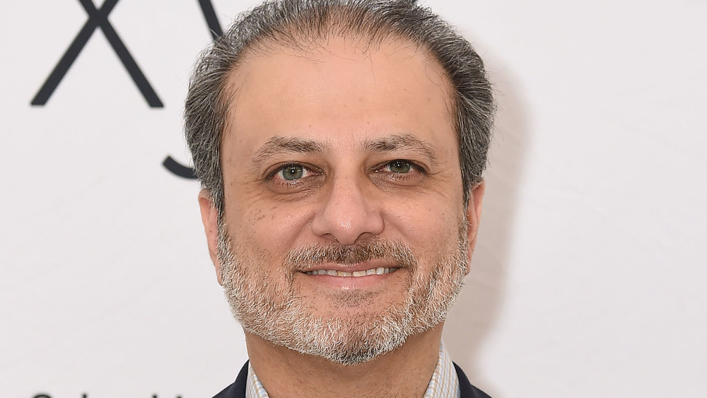 Preet Bharara, smiling at camera