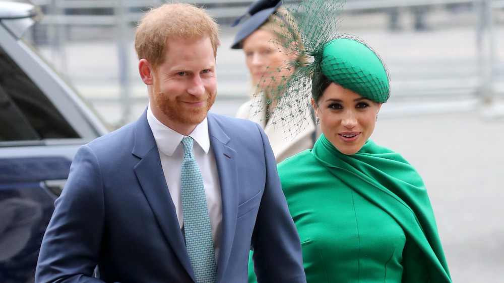 Prince Harry and Meghan Markle walking hand-in-hand