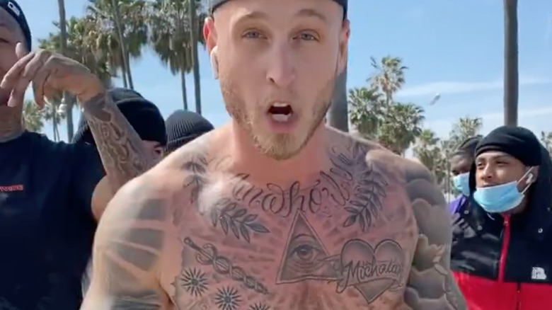 Chet Hanks shirtless with tattoos