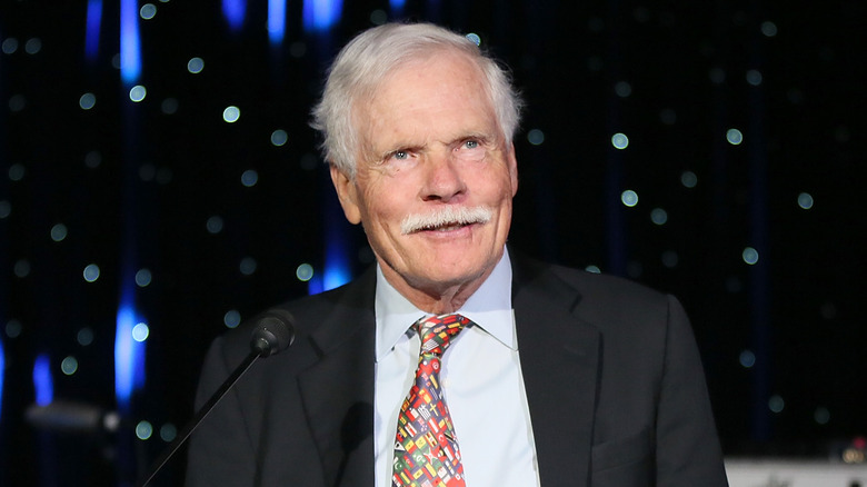 Ted Turner black suit tie with flags