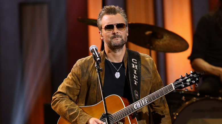 eric church with a guitar