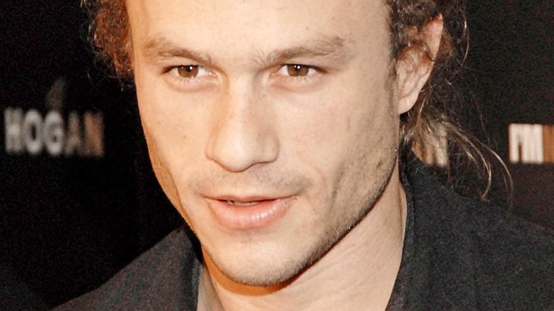 Heath Ledger poses in a blazer